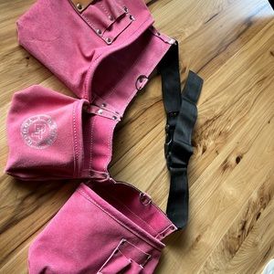Pink Born Tough suede tool belt, lots of pockets. Cute Handygal tool apron.